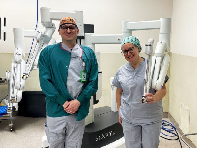(l-r) Operating Room Manager Sean Peace, RN, and Robot Coordinator Jamye Ladebruk-Cathcart, RN.