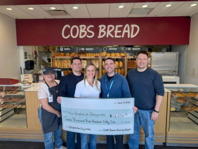 COBS Bread University Heights cheque presentation